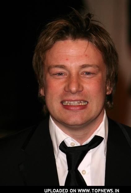 The Man With The Fat Face Jamie Oliver's new Notting Hill Gate restaurant/shop/cooking school gets the onceover from our 